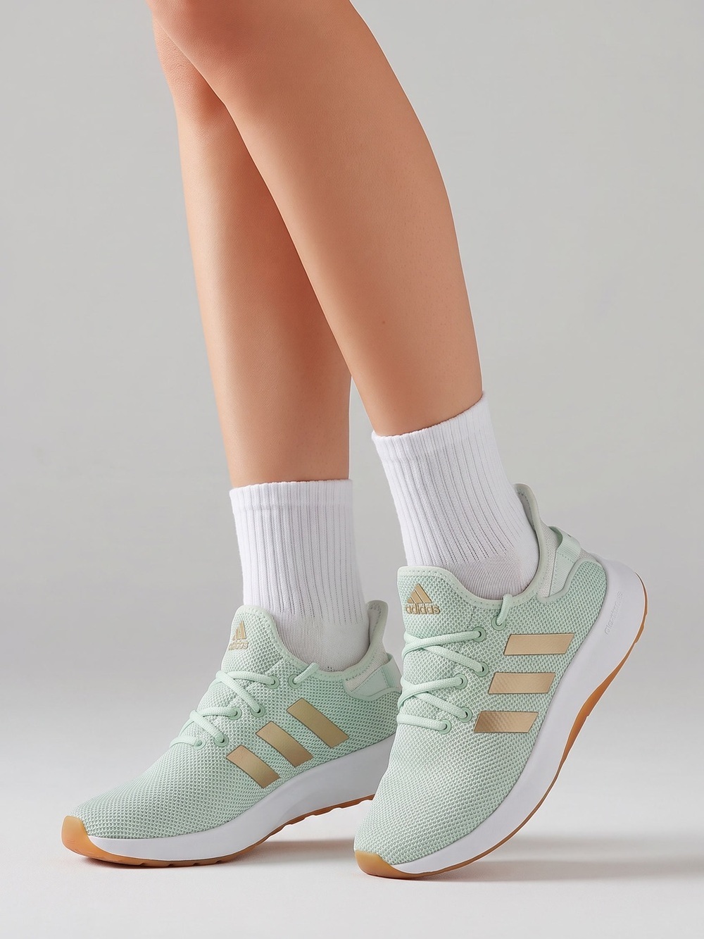 adidas Women’s Mint Green Sneakers with Bronze Stripes